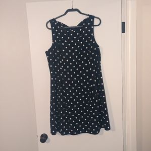 Polka dotted 1950s style flare dress with bow shaped back detail (by Eliza J)